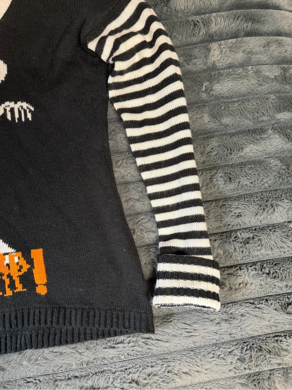 Black & White Skeletal Graphic Crewneck Sweater with Orange Accent